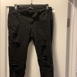 Black ripped up skinny jeans
